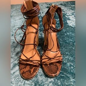 JLO kriss cross wedges